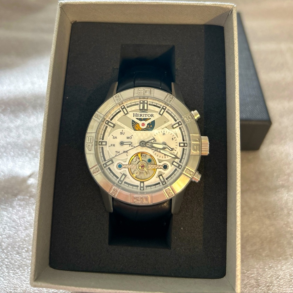 Heritor semi skeleton watch silver white. Moon sun top. New in box.